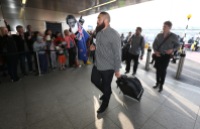 LONDON, ENGLAND - NOVEMBER 02: Charlie Faumuina, of Rugby World Cup winners, the New Zealand All Blacks arrives with team mates at Heathrow Airport at the start of their journey back to New Zealand on November 2, 2015 in London, United Kingdom. (Photo by David Rogers/Getty Images for England 2015)